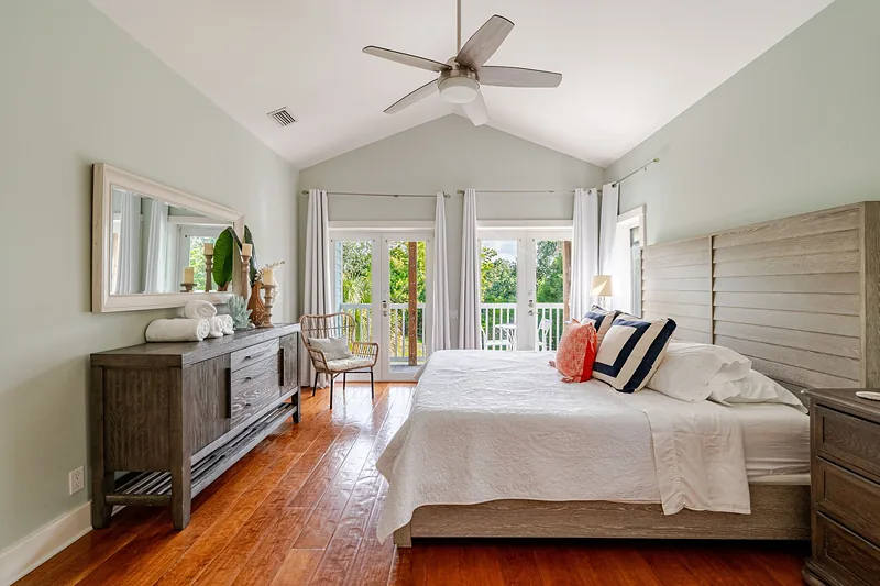 Master bedroom with a king bed and French doors