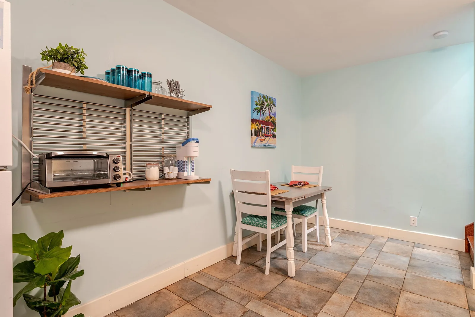 Kitchenette with a small dining table