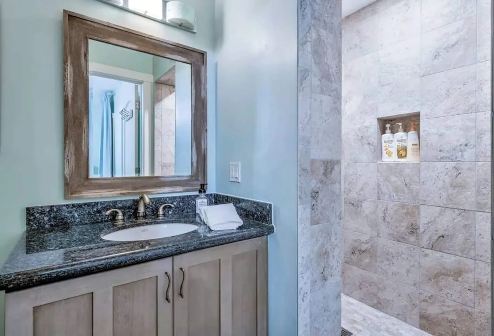 Downstairs suite bathroom with a walk-in shower