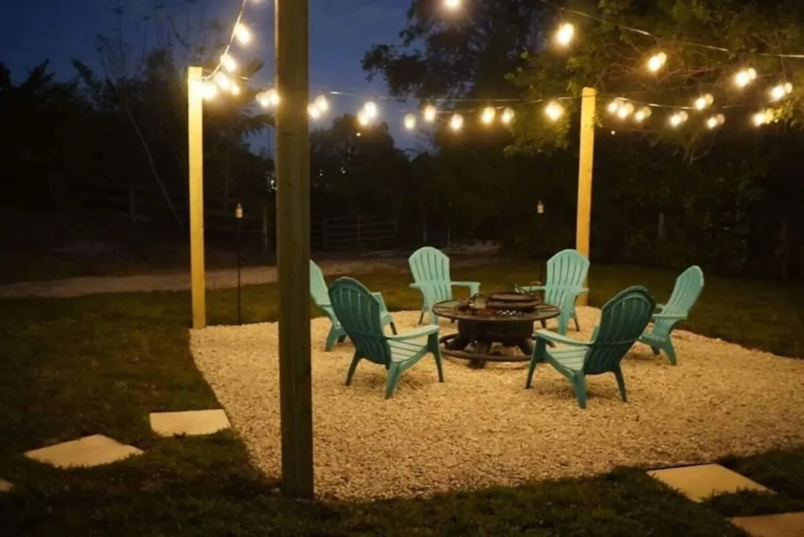 Fire pit under string lights
