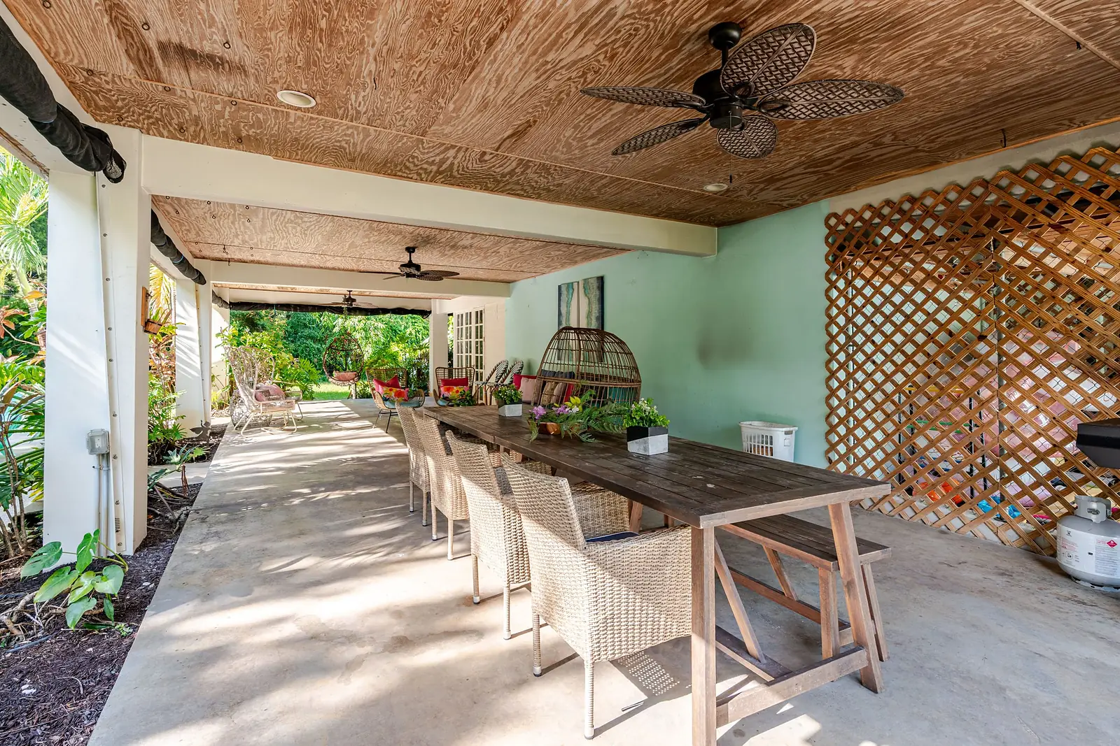 Long dining table under the covered lanai