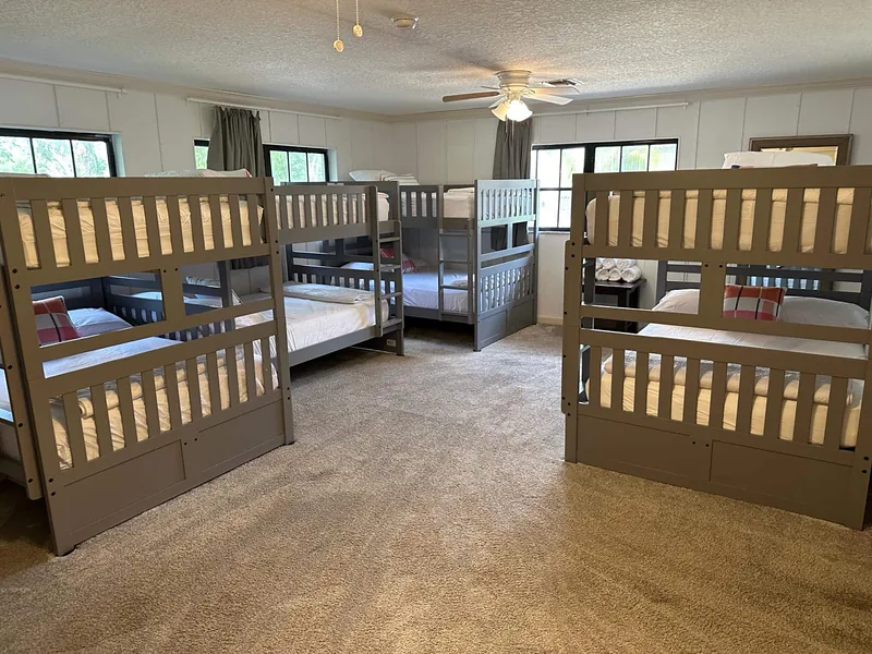 Bunk room with four full-over-full bunk beds