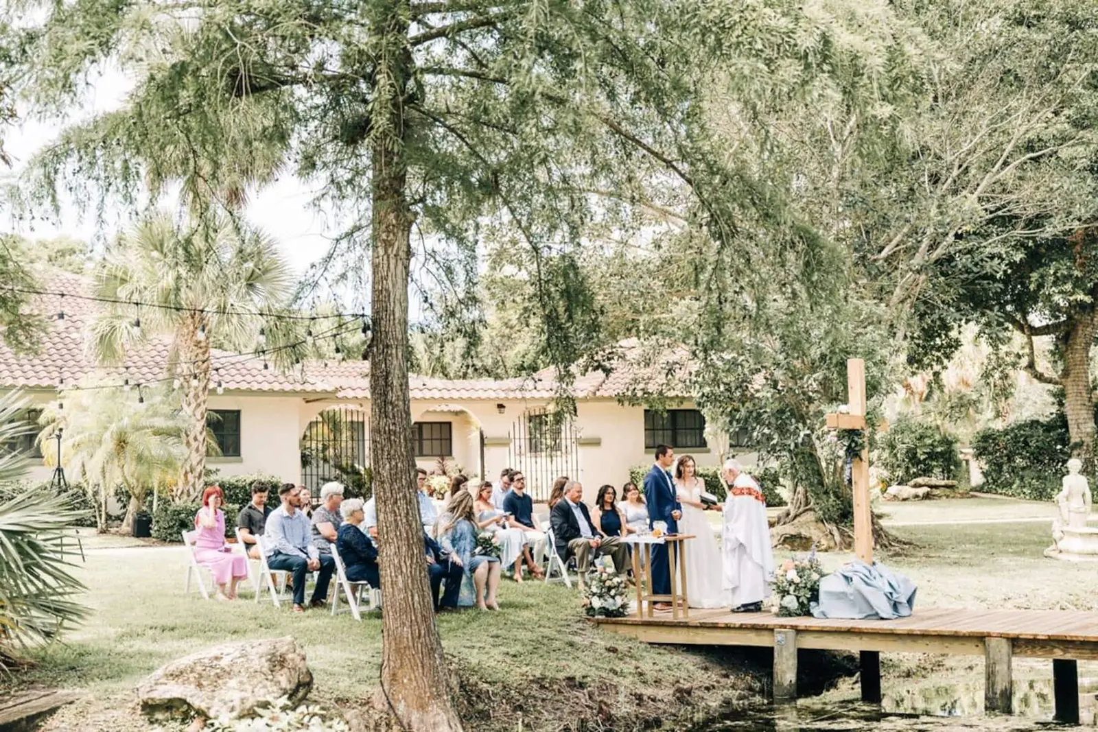 Ceremony on the dock by the pond