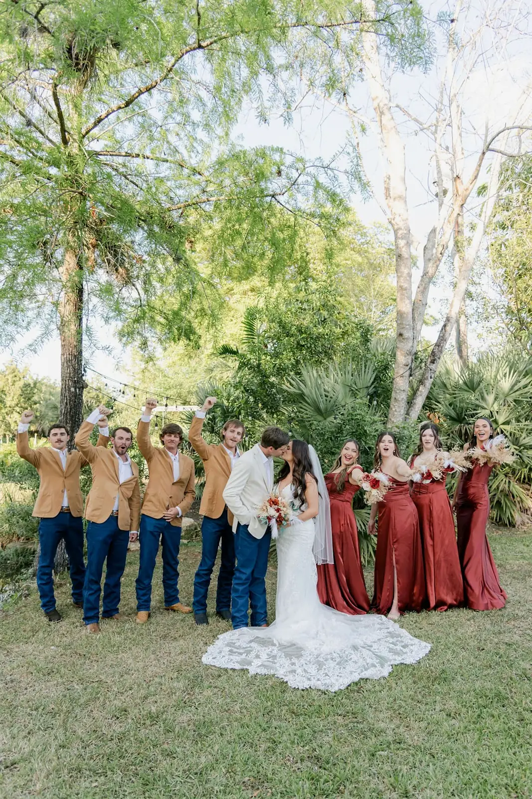 Wedding party gathered on the lawn